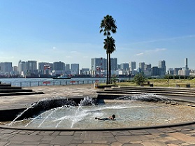 a fountain and a child