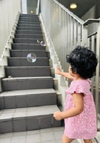 soap bubbles and a child